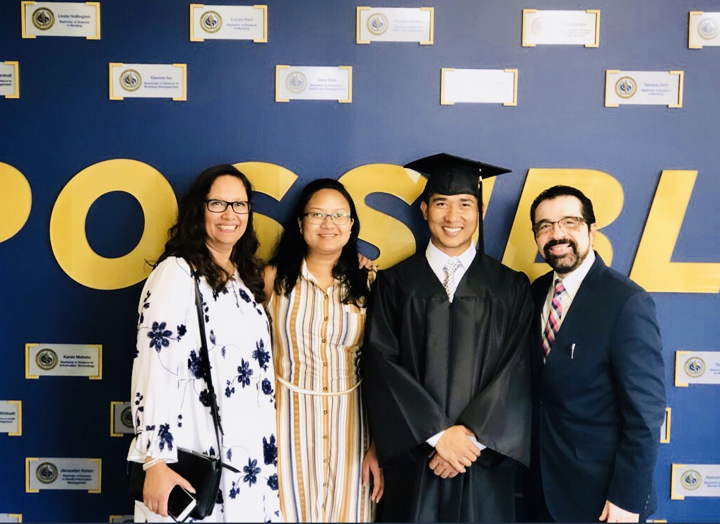 Karan Mahato with his family at graduation